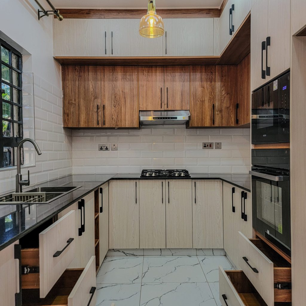 Modern Kitchen designs by Kijana Msafi Interiors