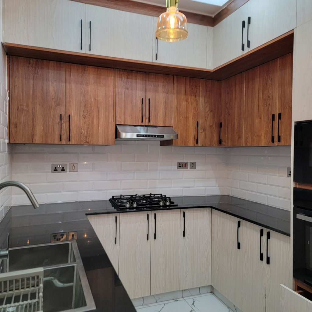 Modern Kitchen designs by Kijana Msafi Interiors